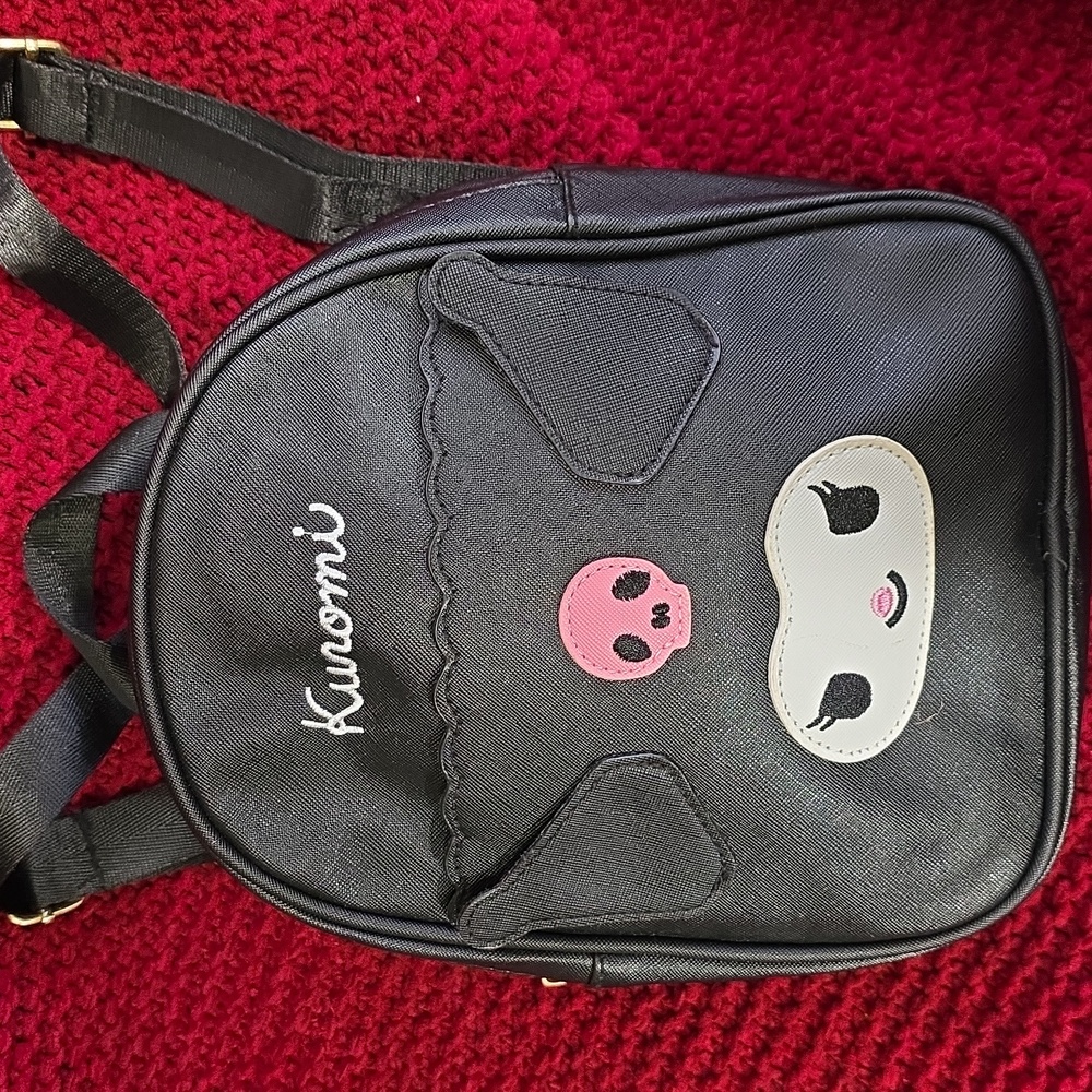Kuromo Black Backpack with Purple Interior 8x9 Inches